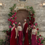 dance performers in red velvet dress