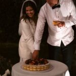 couple cutting cake